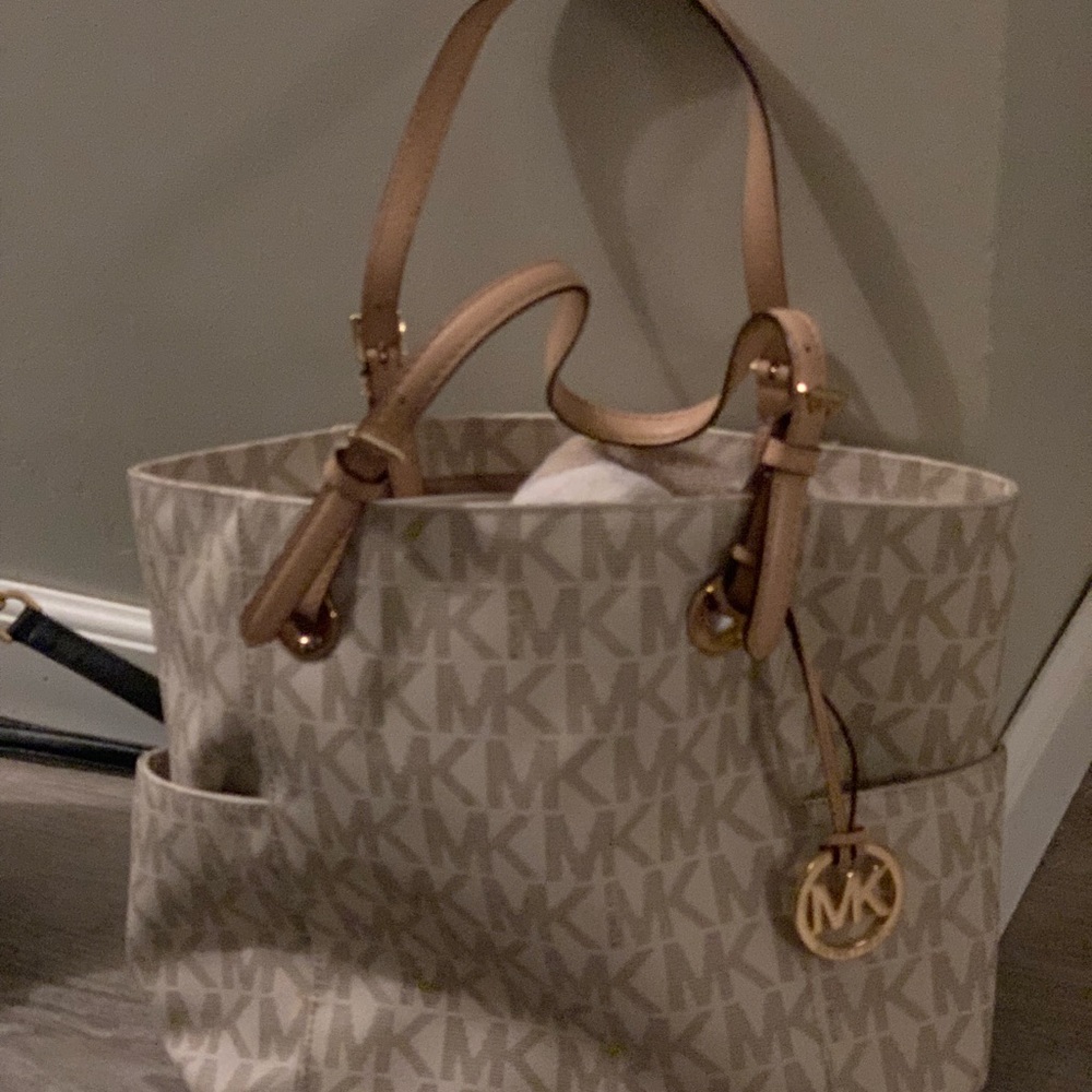 Off white MK bag with MK design